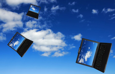 flying flock of laptops