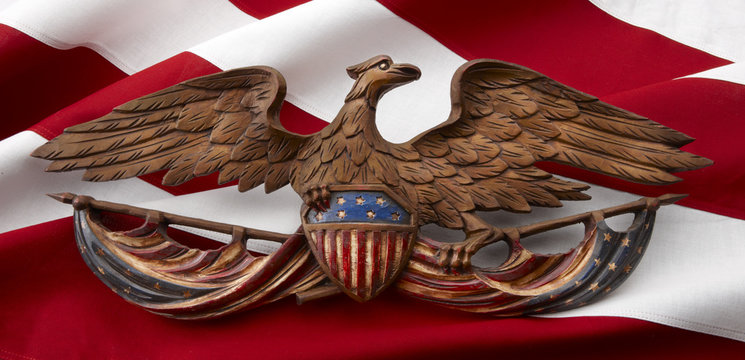 Carved American eagle on flag