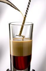 Pour liquid layer into a long drink glass.