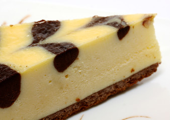 Gourmet slice of cheesecake on the white background