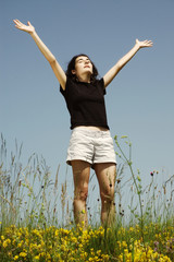 Beautiful young girl enjoying sunshine