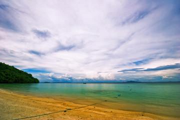 Tropical beach under blue sky. Thailand