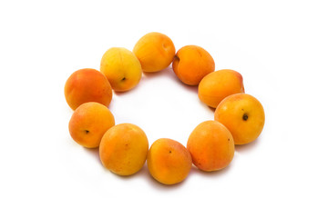 Ripe apricots  on white background