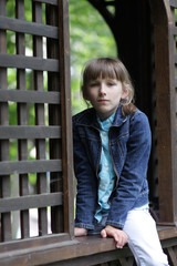 Teen poses at summer house