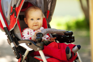 Baby in sitting stroller