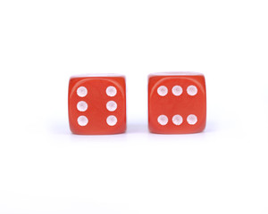 two red game dice isolated on white