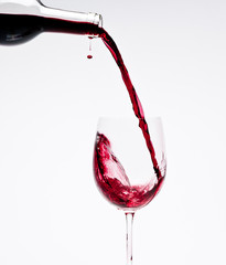 Pouring Red Wine with beautiful drops