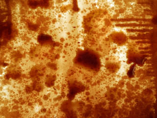 textured paper with brown coffee drops