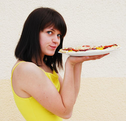 Young woman with pizza