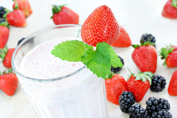 Berry smoothie or milkshake top view.