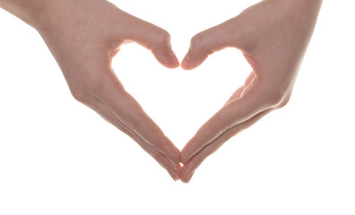 Fototapeta premium Young woman’s hands made in the form of heart