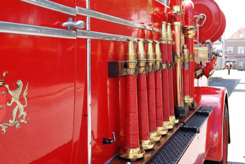 Vintage fire engine and hoses