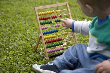 Little kid with abacus