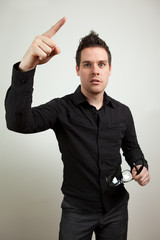 Guy pointing up with his index finger