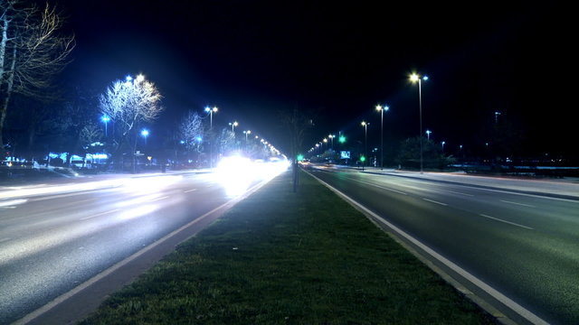 Timelapse night traffic on boulevard. HD 1080p.