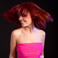 Naklejka premium Young redhead model