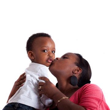 Young afro american family in a living room setting.