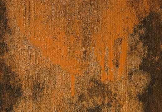 Orange painted grunge wall