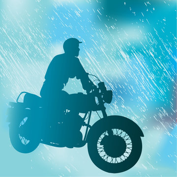 Motorcyclist In The Rain