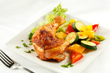 Roasted chicken leg and vegetables