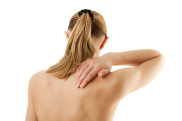 Fototapeta premium Woman massaging pain back isolated on white