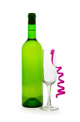 Bottle of wine and glass with streamer on white