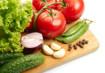 Fresh vegetables on wooden hardboard