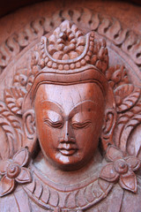 wooden buddha statue