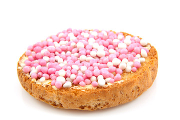 Rusk with pink and white mice over white background
