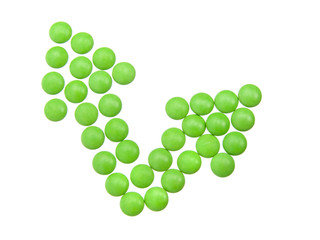 green tablets in arrow formation,