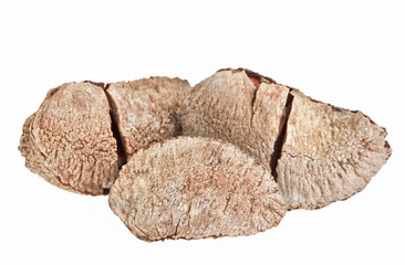 Few whole shelled Brazil nuts isolated on white