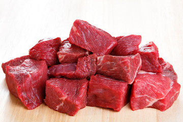 Raw beef on cutting board