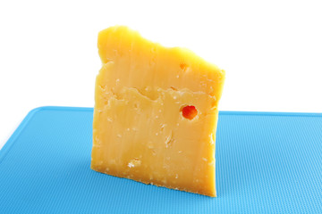edam cheese on blue