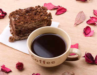 Biscuit cake with cup of coffee