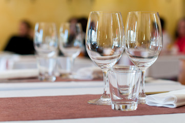 empty goblets on table