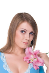 Close up portrait of young beautiful woman with flower