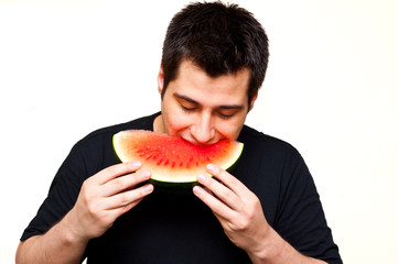 man eating watermelon