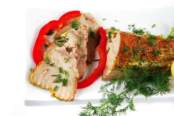 roast tuna with vegetables on ceramic plate