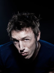 Fototapeta premium Funny Man Portrait frowning suspicion