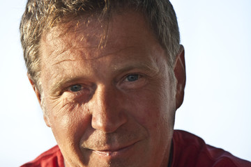 man looking confident and smiles