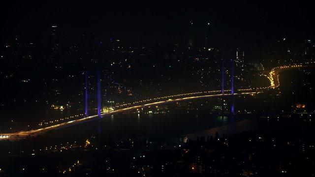 Timelapse Bosphorus bridge over hill during night. HD 1080p.