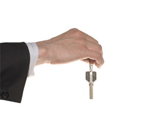 business man hand with a key isolated over white