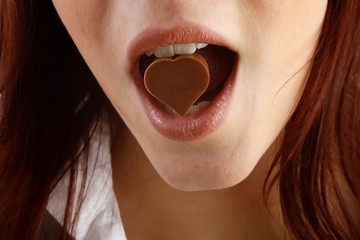 beautiful woman with a heart of chocolate
