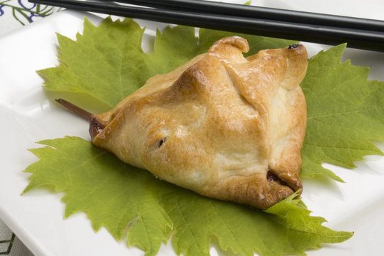 Dulce sobre hoja de parra