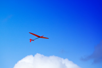 Fototapeta na wymiar Model of plane on sky background