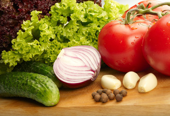 Fresh vegetables on wooden hardboard