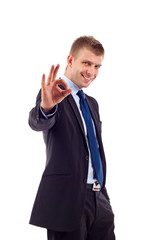 Businessman making ok gesture