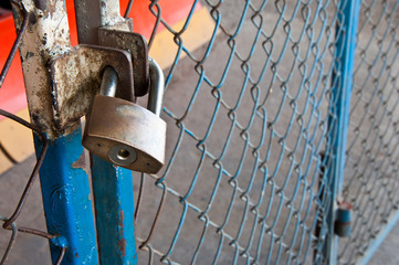 Padlock and chain link frence