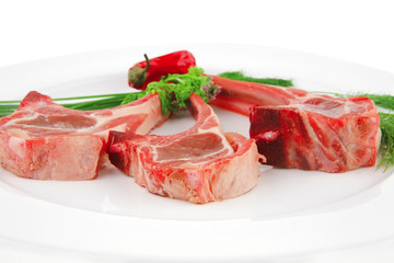 uncooked ribs on plate