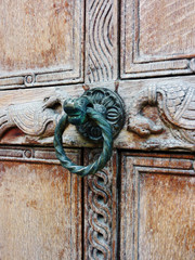 Antique door of medieval Greek church, detail center focused